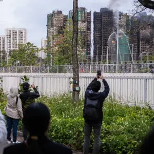 Hong Kong Man Arrested After Posting Online About Deadly Fire